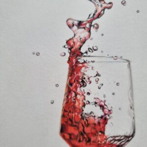 Red Wine Splashing In Glass
