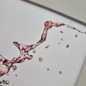 Red Wine Splashing In Glass